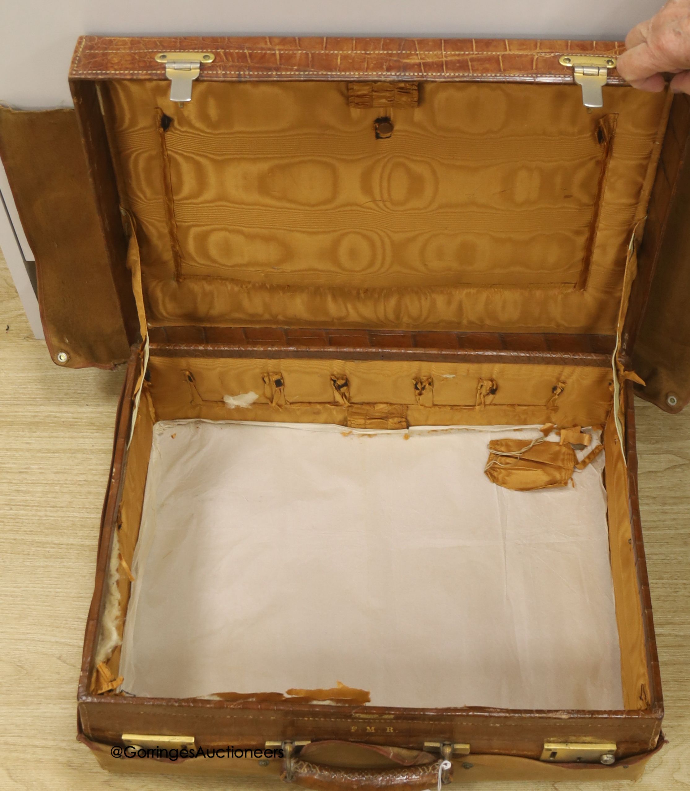 A Harrod's Limited crocodile skin case, width 50cm